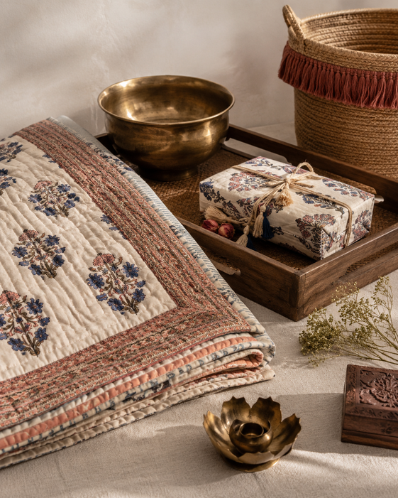 Handmade quilt and bedding lifestyle setup