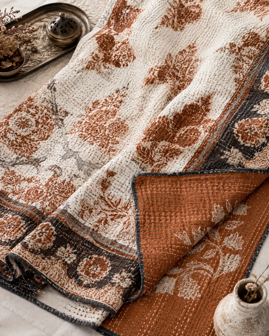 Rust black kantha throw closeup
